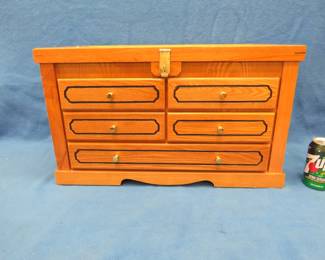 Lot 235. Locking wooden cabinet (jewelry box?) with a glass top and a North American Hunting Club logo. Includes lock and key. 23" x 13 1/2" x 11 1/2".