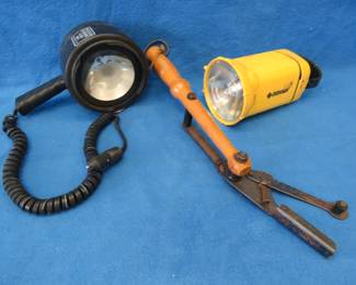 Lot 368. Q-Beam Black Max floodlight, Eveready lantern (needs battery), and a vintage clay pigeon thrower.