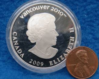 Lot 361. 2010 proof Canadian $25.00 sterling silver coin celebrating the sport of bobsledding. 27.78 grams