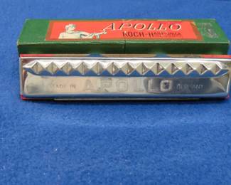Lot 82. Ands Koch toy diatonic harmonic. Lower row of holes are blanks