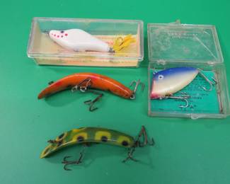 Lot 79. Two Helin Flatfish 420 and T4, Tackle Industries Swimmin Minnow in a box with papers, and Mercer's 2 1/2" Water Turkey in a box with papers.