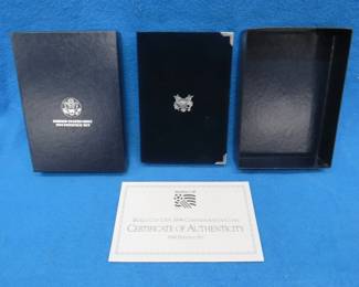 Lot 192. 1994 US Prestige Proof Set with a 90% silver dollar coin