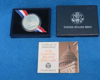Lot 125. 1994 US Capital Commemorative 90% silver dollar. 26.73 grams