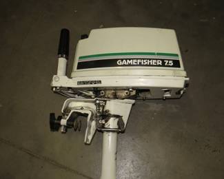 Lot 233. Sears Gamefisher 7.5 HP outboard motor. Untested. Has internal gas tank or can be run from an external tank. Ran fine when last used.