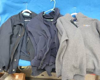 Lot 114. Men's outerwear with Connexus Energy logos. Sizes as pictured.