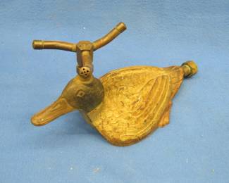 Lot 337. Vintage rare cast iron mallard duck sprinkler with brass fittings