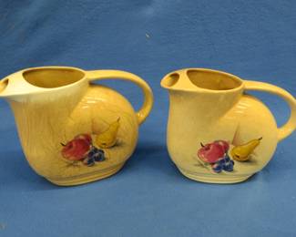 Lot 366. Two Knowles Utility Ware pitchers with crazing