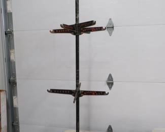 Lot 344. Old cast iron Wagner Hollow Ware store display stand.