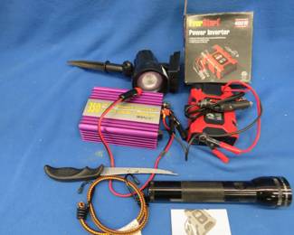 Lot 272. Two power inverters, a solar light, and more