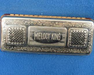 Lot 222. Fr. Hotz double-sided 64-reed Melody King harmonica . Sounds great.
