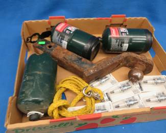 Lot 267. Propane bottles, spark plugs, and more