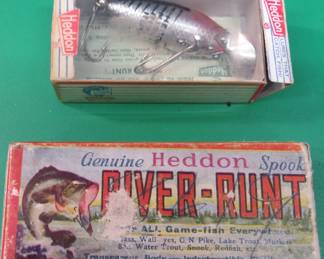 Lot 76. Two Heddon Midget River Runts in boxes. The 2-piece cardboard box has a catalog. The other box has papers