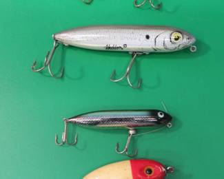 Lot 70. Clark's Water Scout, Heddon Zara Spook, South Bend Better Bass-Oreno, and a Heddon Zara Puppy