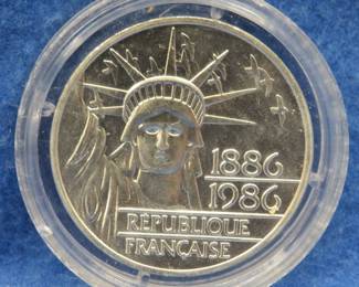 Lot 227. 1986 French 100F sterling silver coin. 30.3 grams.