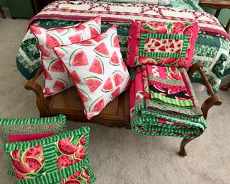 Several handmade quilts.