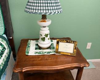 End table and adorable lamp.