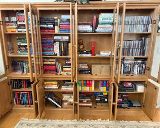Several books, CDs, and DVDs.