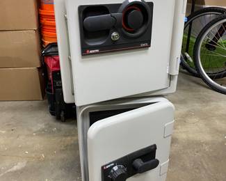 Two Sentry safes. No key and unknown combinations
