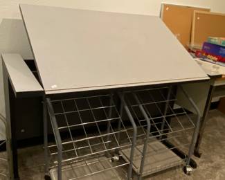 Drafting table and carts to hold rolls of paper. Or great for umbrellas!