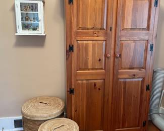 Solid storage cabinet and baskets