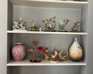 Lots of bird figurines and vases