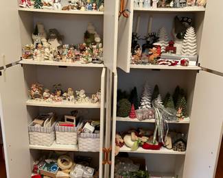 Lots of Christmas decorations and cabinets