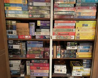 Cabinet full of brand new puzzles. 2000, 1500, 1000, 750, 500, 350 and 300 piece.