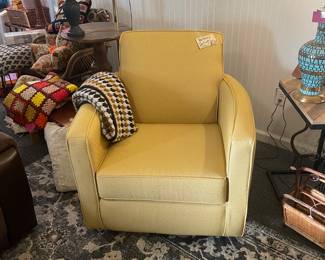Yellow swivel chair