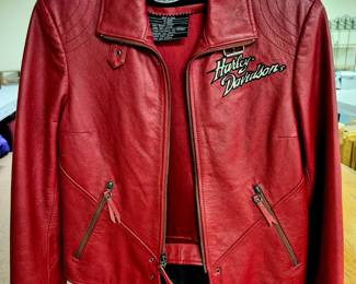 Vintage and collectible woman's clothes. Harley Davidson red leather jacket sz. Small