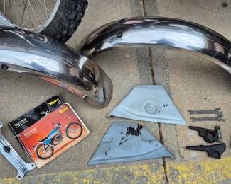 Original parts-chrome fenders, head light, tools, pamphlets