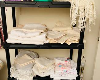 Lots of beautiful table, linens, napkins throws