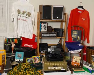 Vintage camera items, vintage travel bags, vintage UT sweater, old, eight track, tape player and some really cool eight track tapes, UT and Baylor items