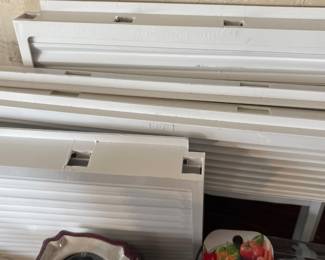 Air conditioning window spacers