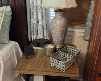 Side tables, lamps, clock radios, phone chargers, neck pillow