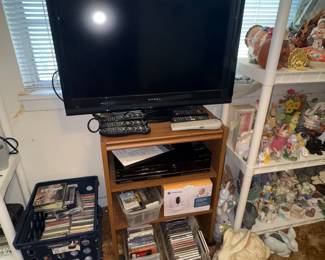 Another flat screen Television, TV stand,