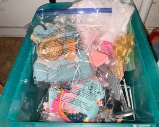 Bags of Doll clothes and accessories