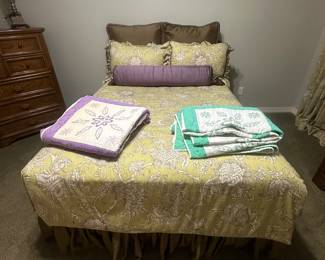 Bedding custom made. Fits a full sized bed.