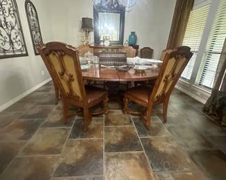 Stanley Furniture. 90" wide and converts to 60". Purchased at Ward Furniture in Huntsville. Includes 8 chairs.