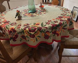 Round dining table with four chairs