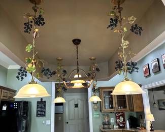 Metal hanging lights with fruit and leaf decor with globes ready to hang (we have 2 left)