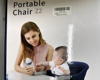 Portable high chair - perfect for restaurant use or trips to Grandma's house - new in box