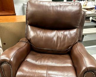 Electric reclining, rocker, swivel overstuffed leather chair in perfect condition