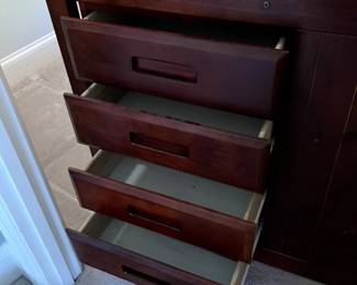 bunk bed has steps to access top bunk and storage drawers