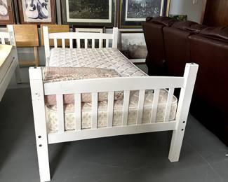 Twin bed in white (we have two of these) - mattresses included for FREE with purchase of the bed.