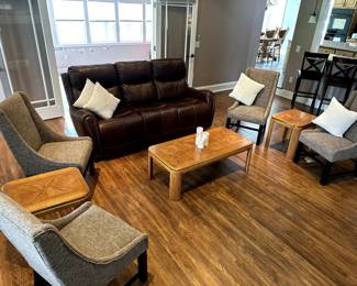 Leather Couch - all electric reclining feature on left and right side. Middle section has pull down shelf for cup holders and storage. Excellent condition.