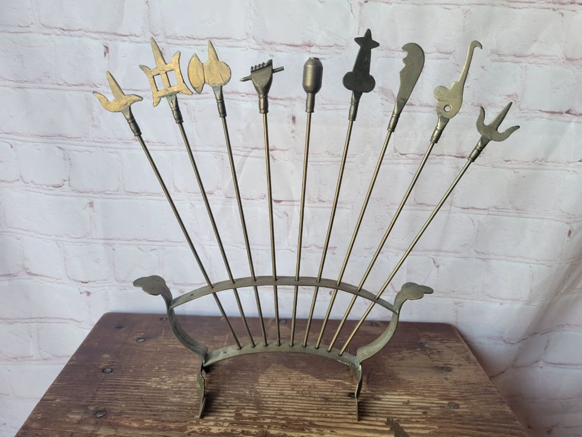 Vintage brass skewer set for kabobs. Missing one skewer.