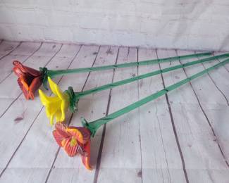 Lot of 3 art glass flowers.