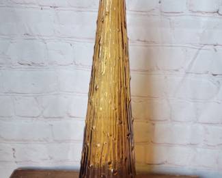 Vintage Italian amber wine bottle with wax drip pattern. No stopper.