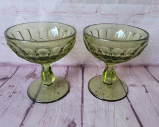 2 Fenton colonial green goblets or sherbet glasses. Glows.