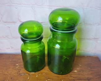 2 of the smaller Belgium glass canisters in green.